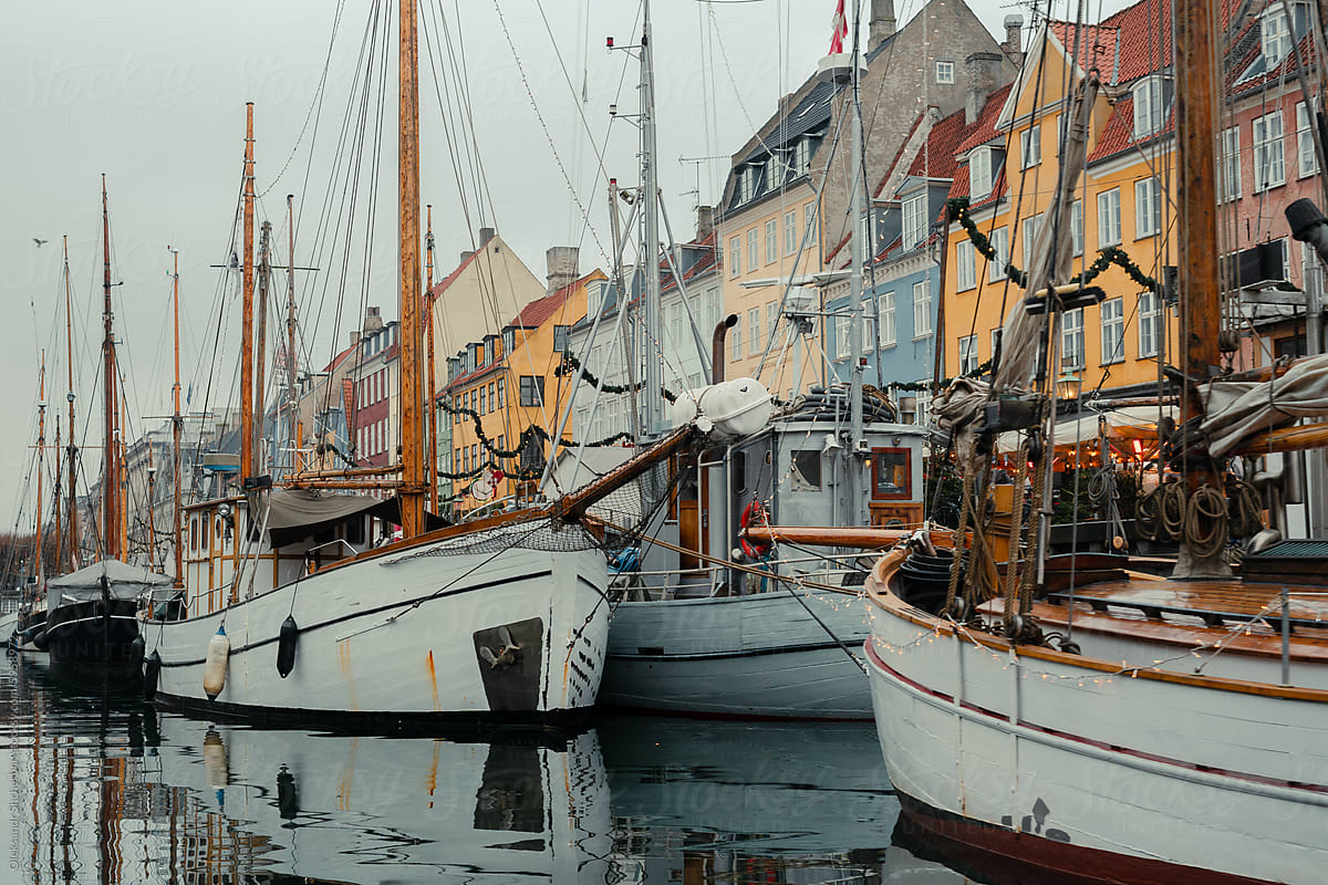 Yachts and boats in Nyhavn harbour in Copenhagen