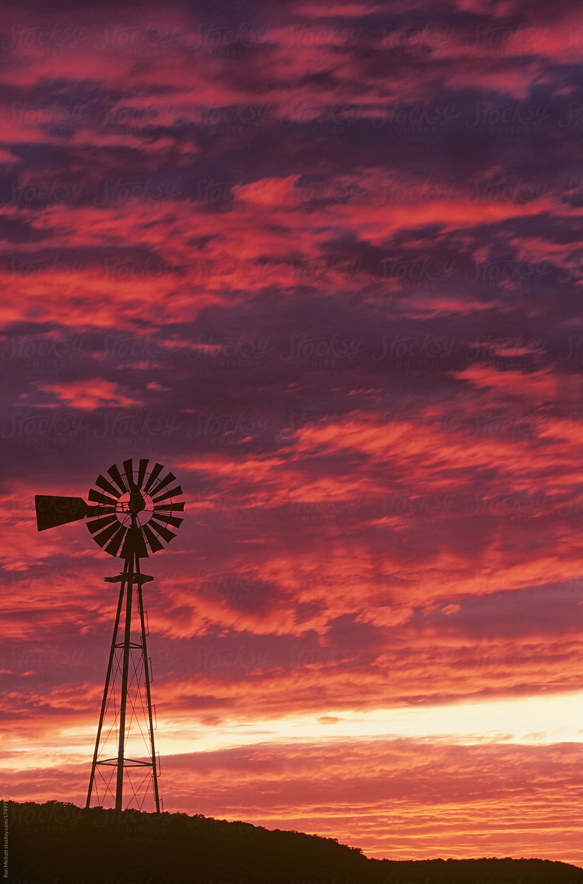 Windmill at sunset on the prairie province of Saskatchewan
