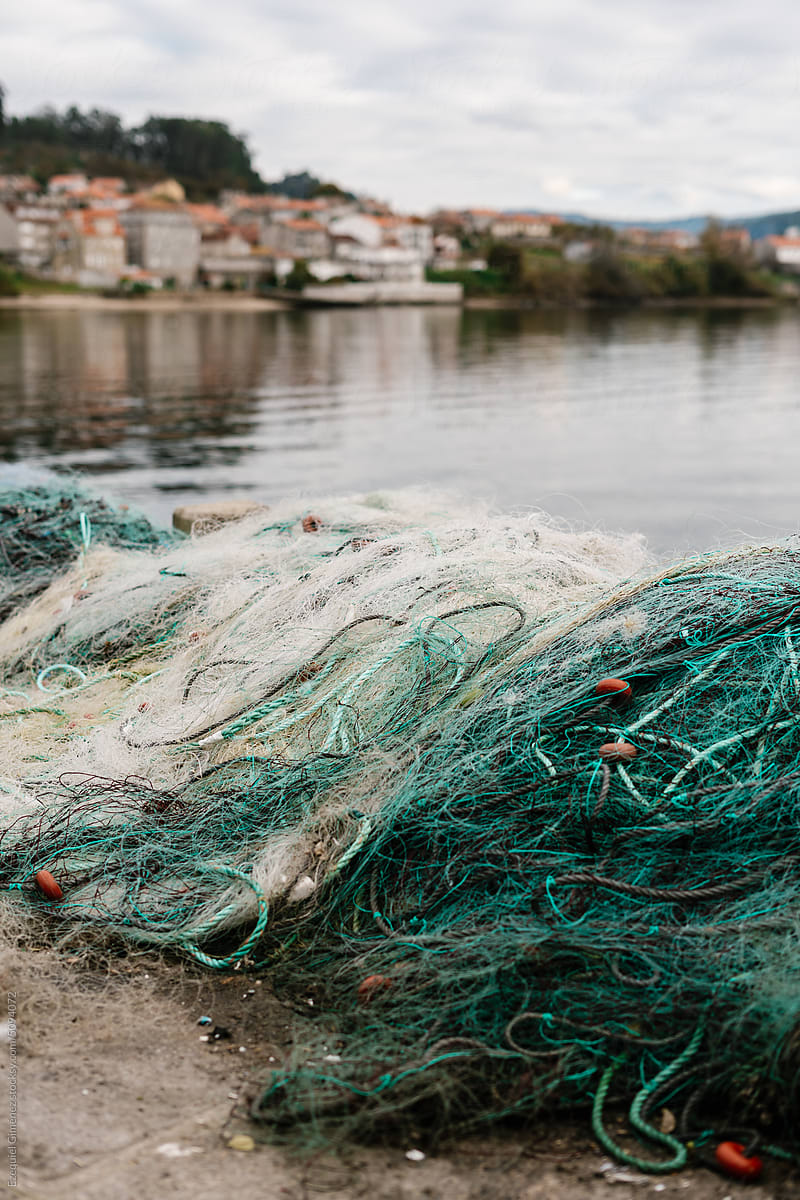 Fishing nets on shore in town