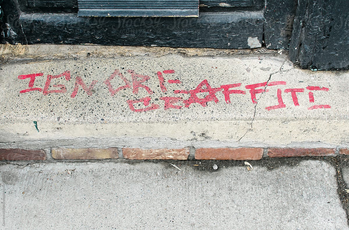 graffiti on ground says 