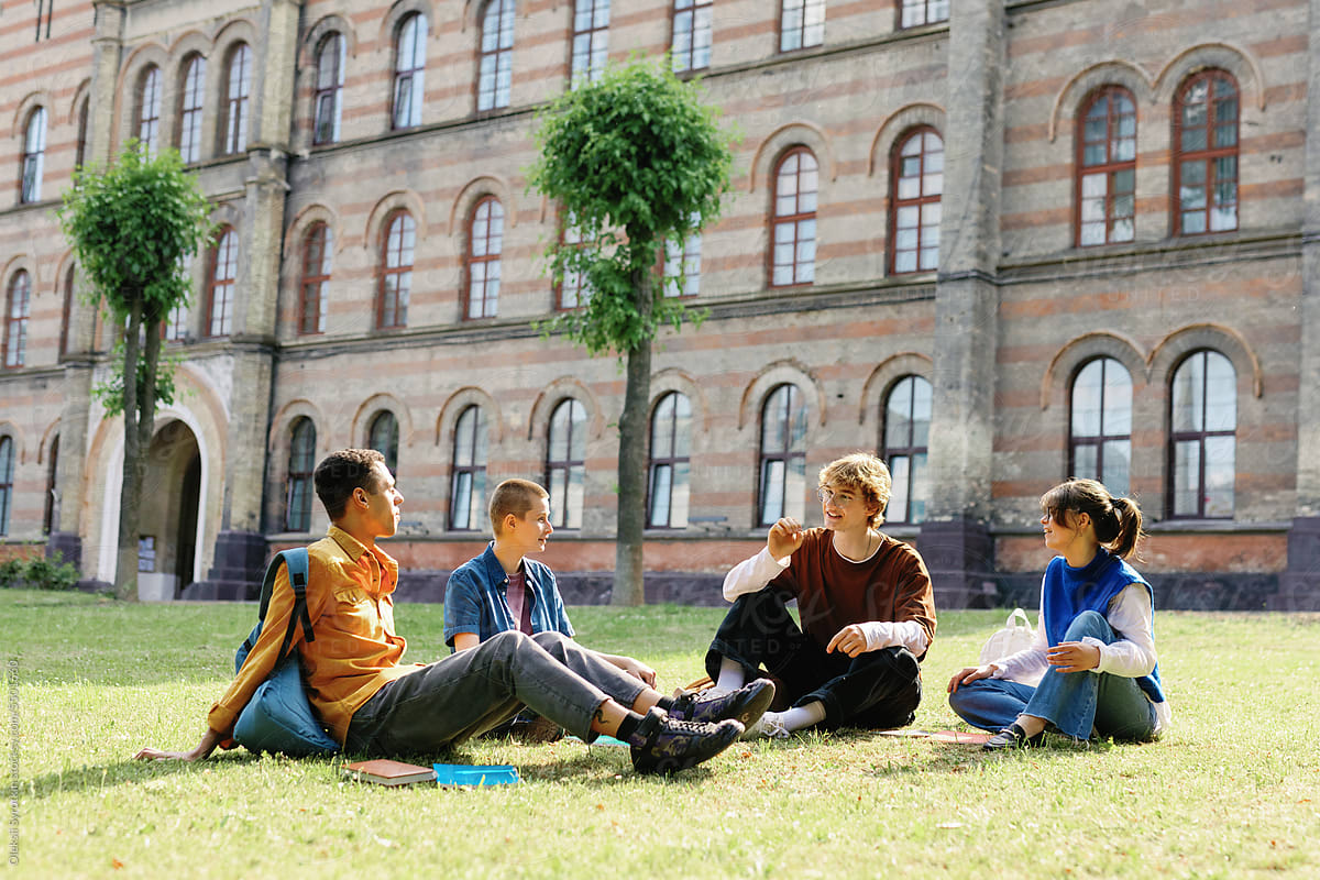 Campus Life Students relaxing on lawn