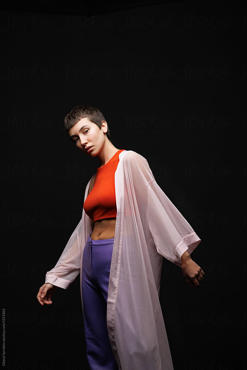 Androgynous model outfit stylish pose