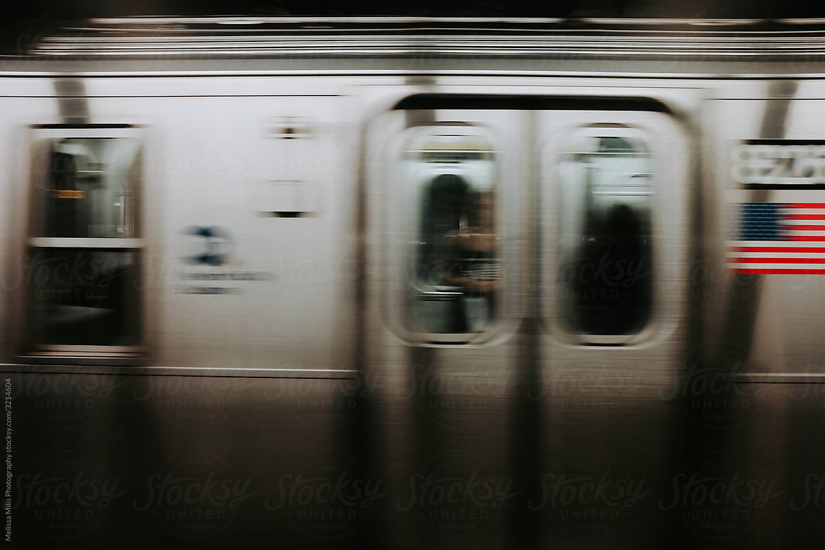 New York Metro subway with American flag moving rushing by