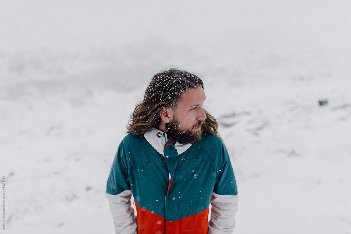 Portrait Of A Bearded Man During Snow Blizzard