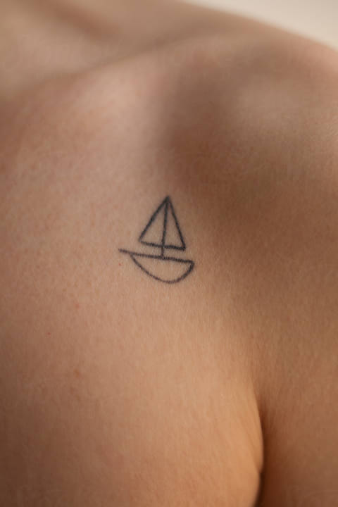 Fine line sailboat tattoo #tattoobeforeandafter #sailboattok #scriptta... |  TikTok