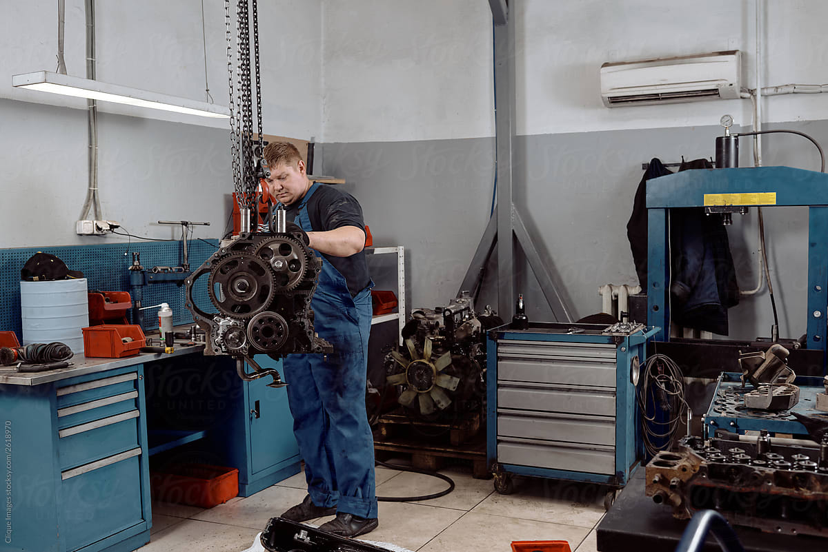 Vehicle Mechanic Repairing Truck Motor
