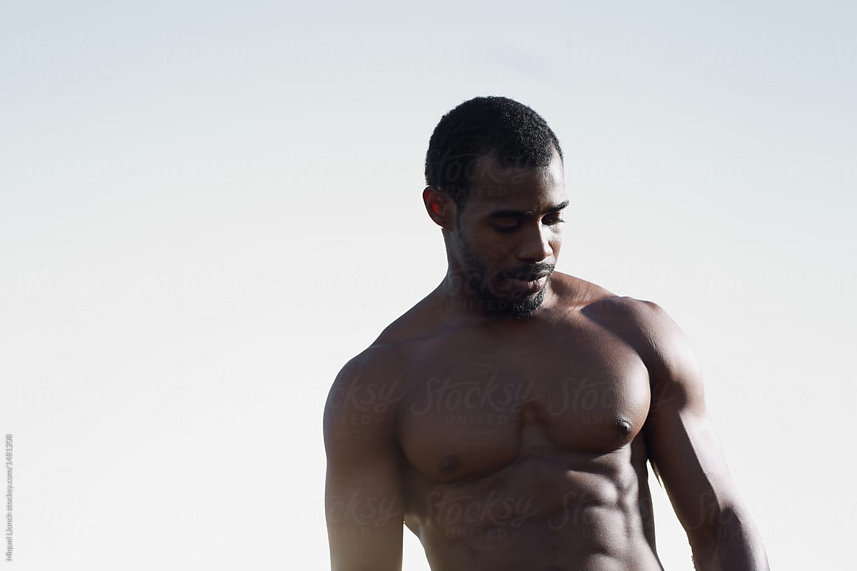 Portrait of african black sportsman on topless