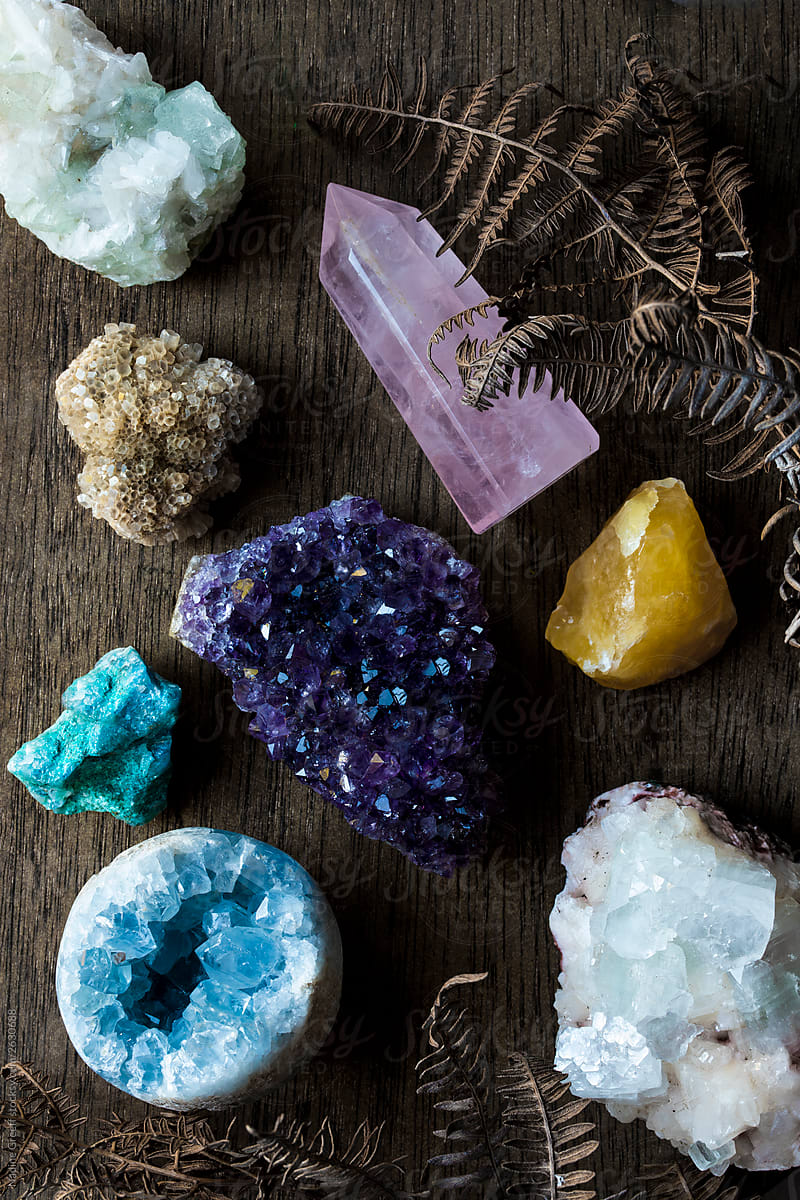 Crystals on wooden surface. Overhead view of many crystals