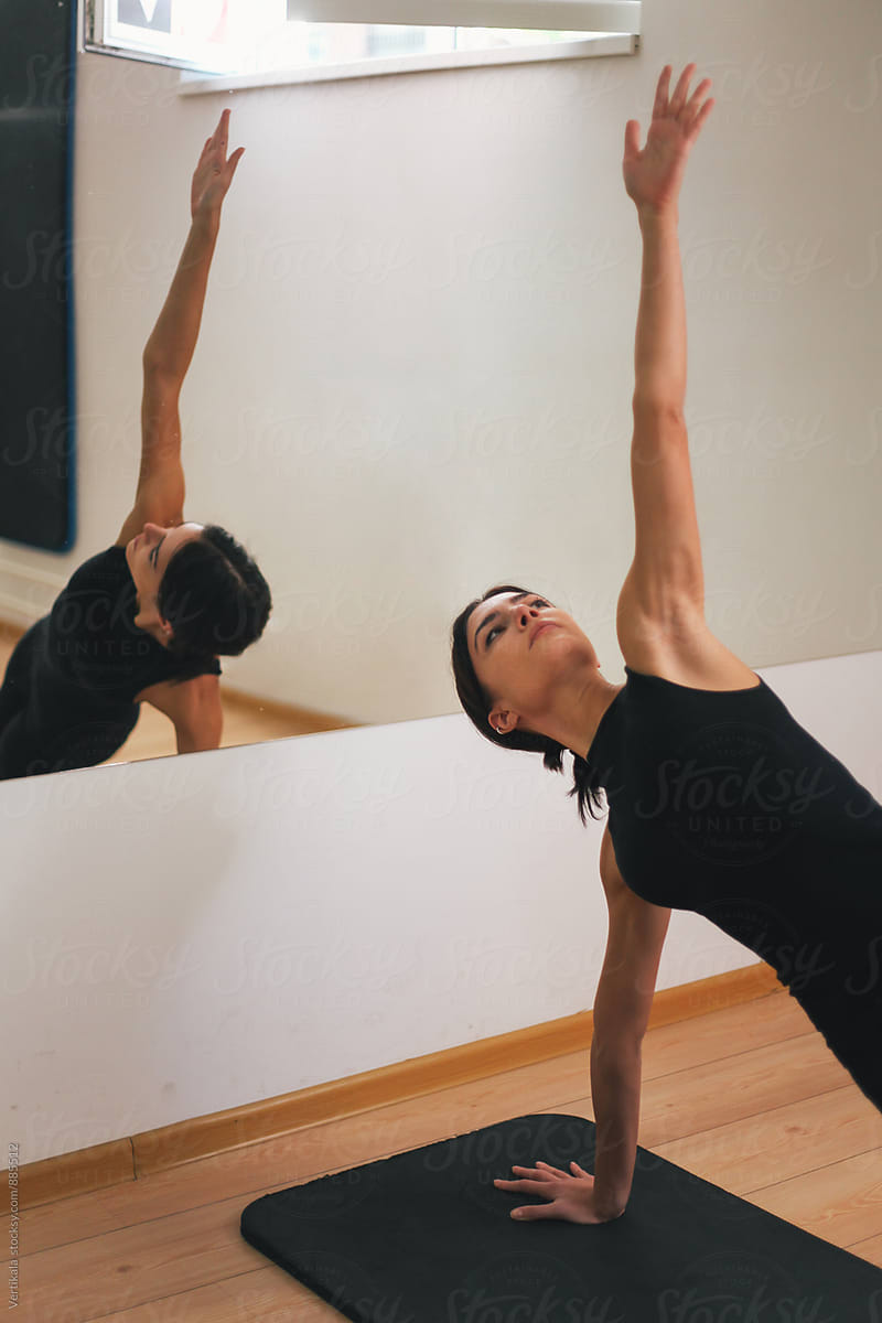 Woman practicing yoga indoor