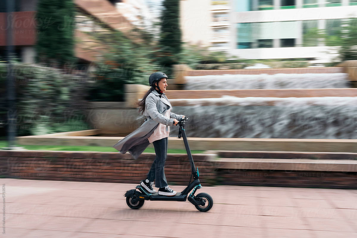 woman in E-mobility electric scooter