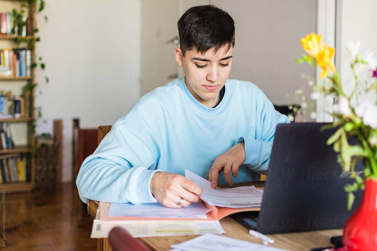 Person at home doing paperwork