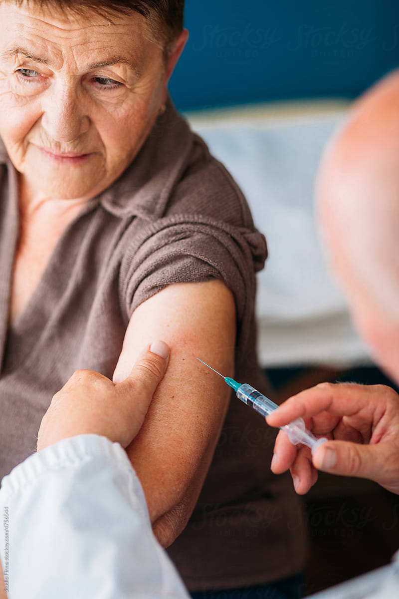 Elder Woman Getting Vaccine