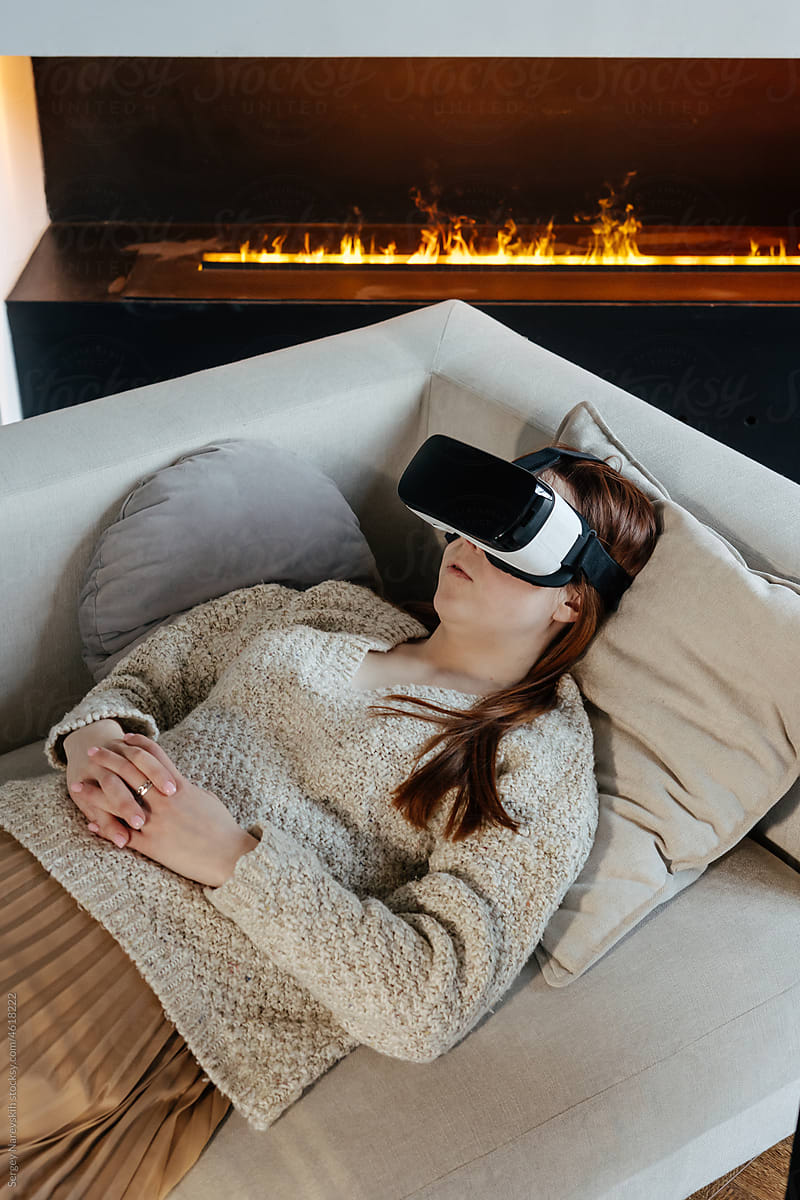 Woman lying on sofa during VR therapy