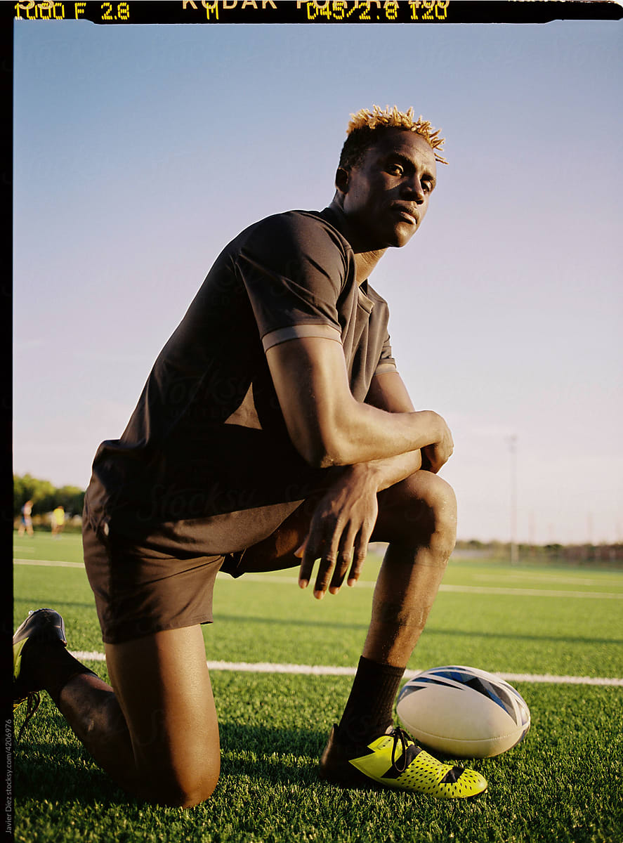 Black man with rugby ball