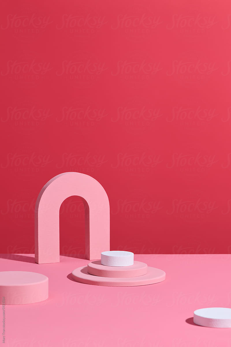 cylinder podium with red arch minimalist aesthetic studio background
