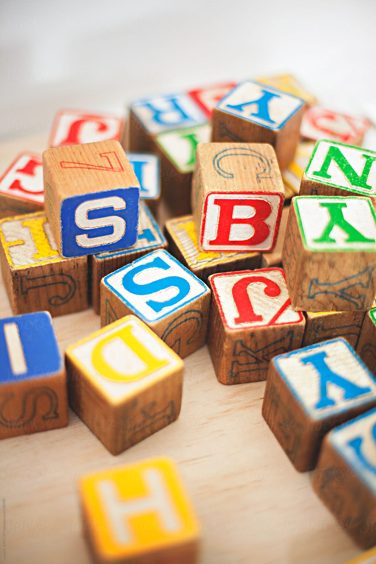 Close Up Of A Childs Wooden Alphabet Blocks Del Colaborador De