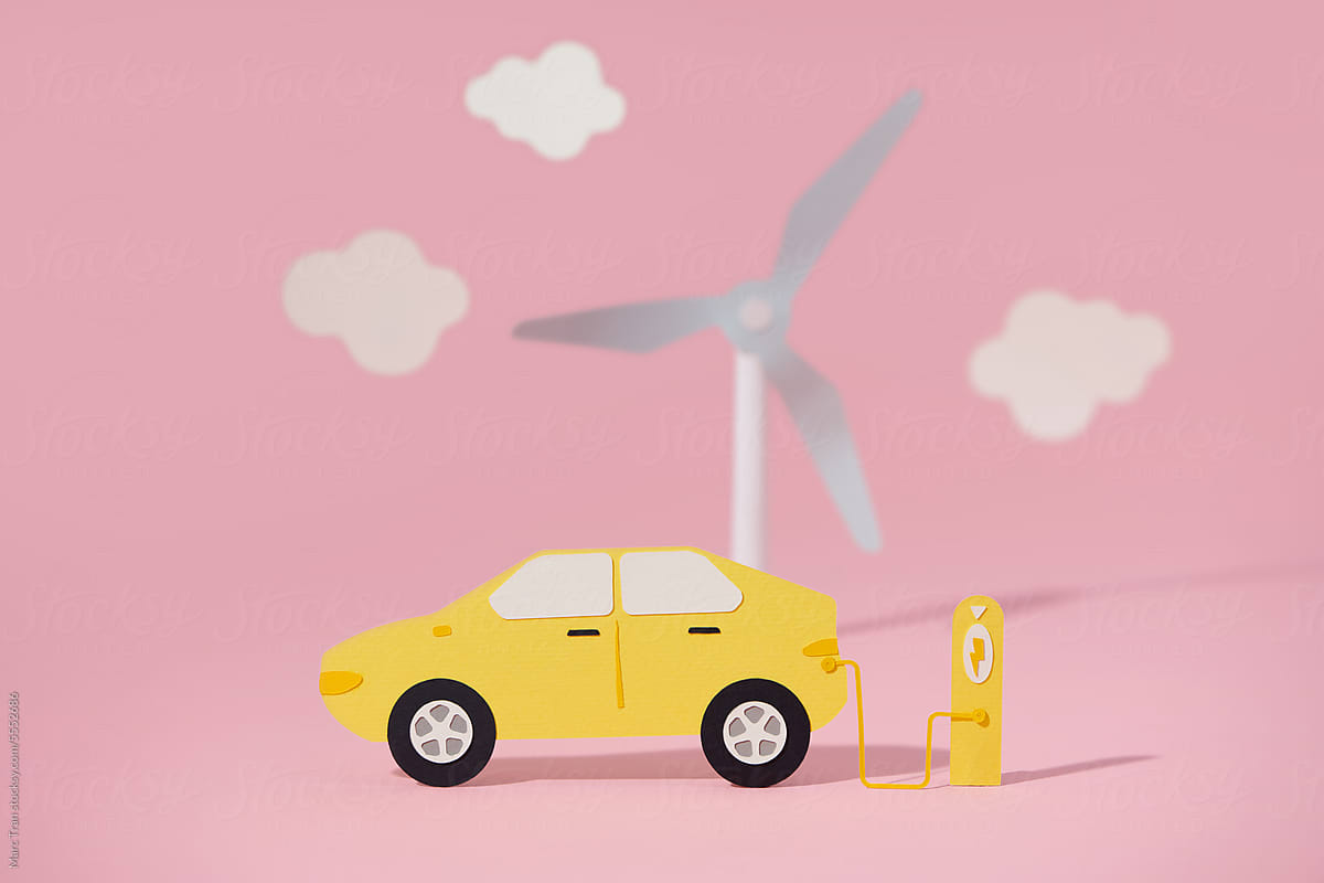 Electric car with charger stand, solar panel and wind turbines