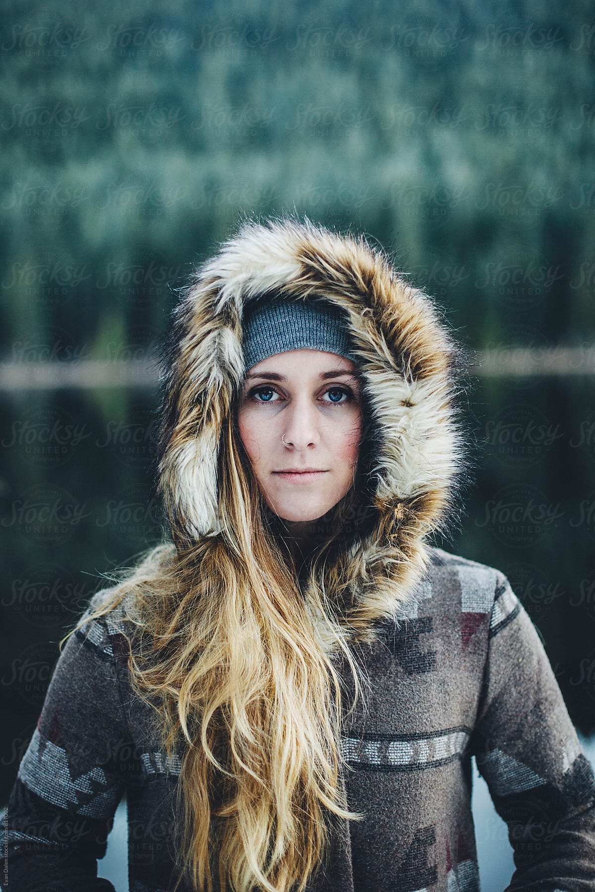 Young Woman In Fur Coat By Freezing Lake