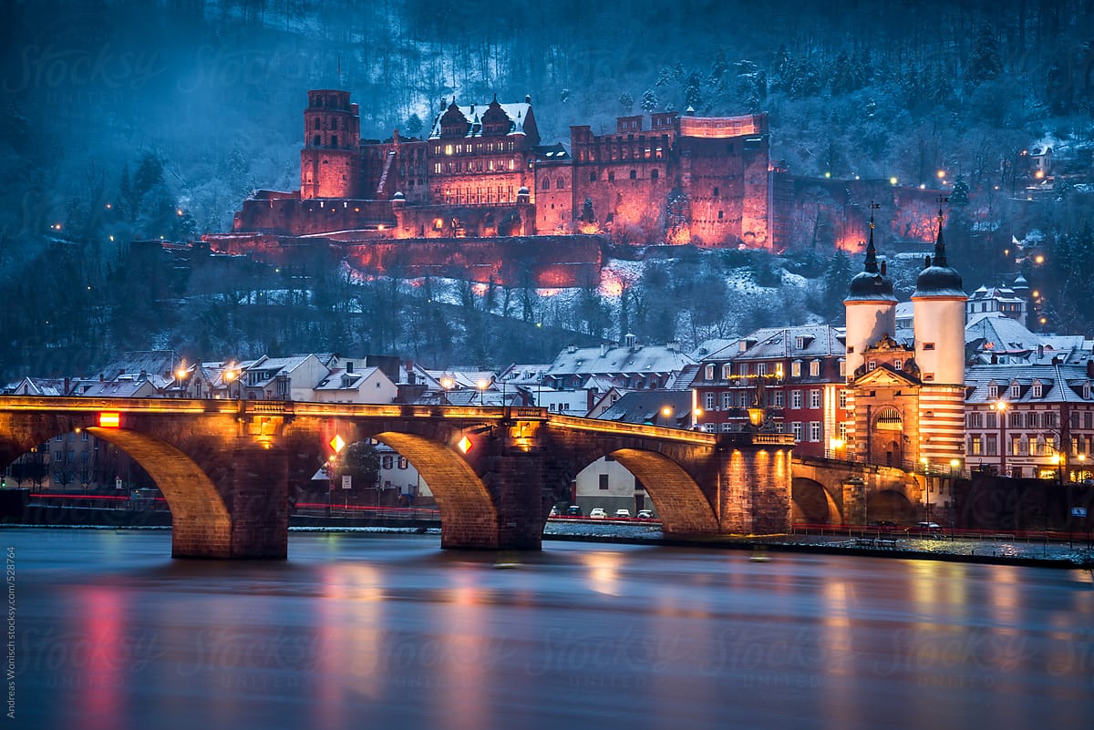 Heidelberg City with Castle and Old Bridge during a Winter Evening