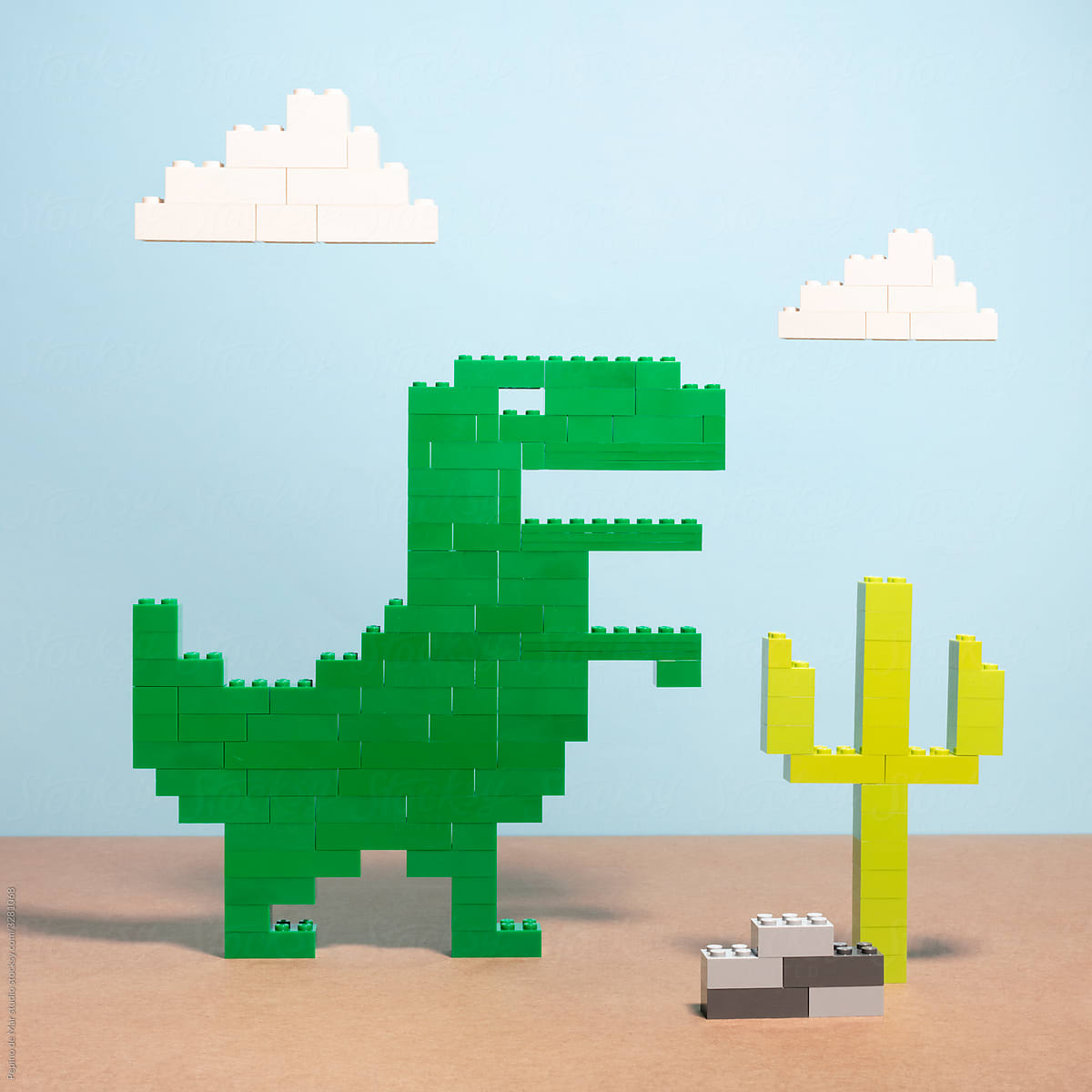 Dinosaur and Cactus Made of Toy Bricks