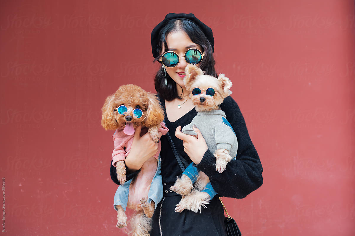 Asian woman with pet dog