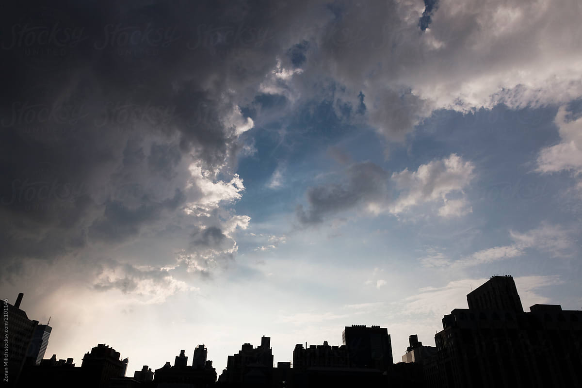 Grand clouds move over New York cityscape.