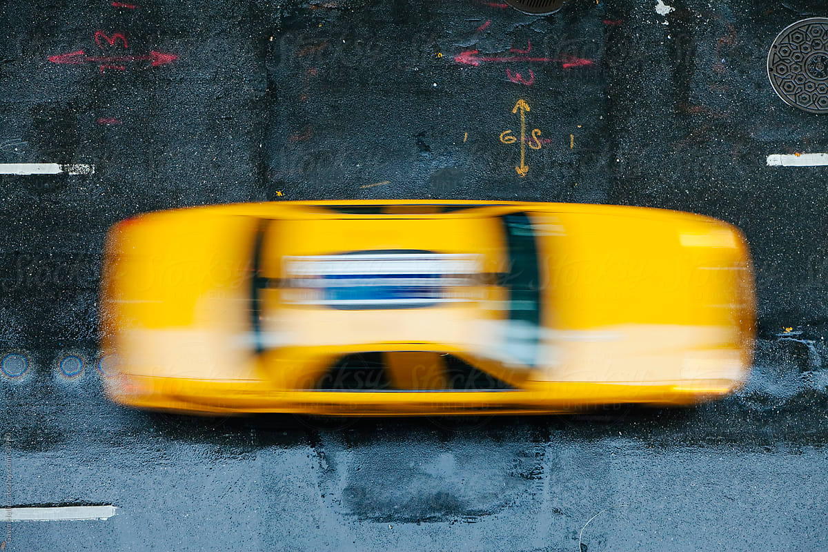 USA, New York City, Manhattan, elevated view of a motion blurred Yellow NYC taxi
