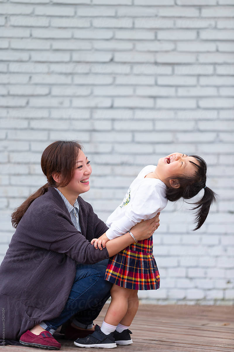 Little asian girl with her mother