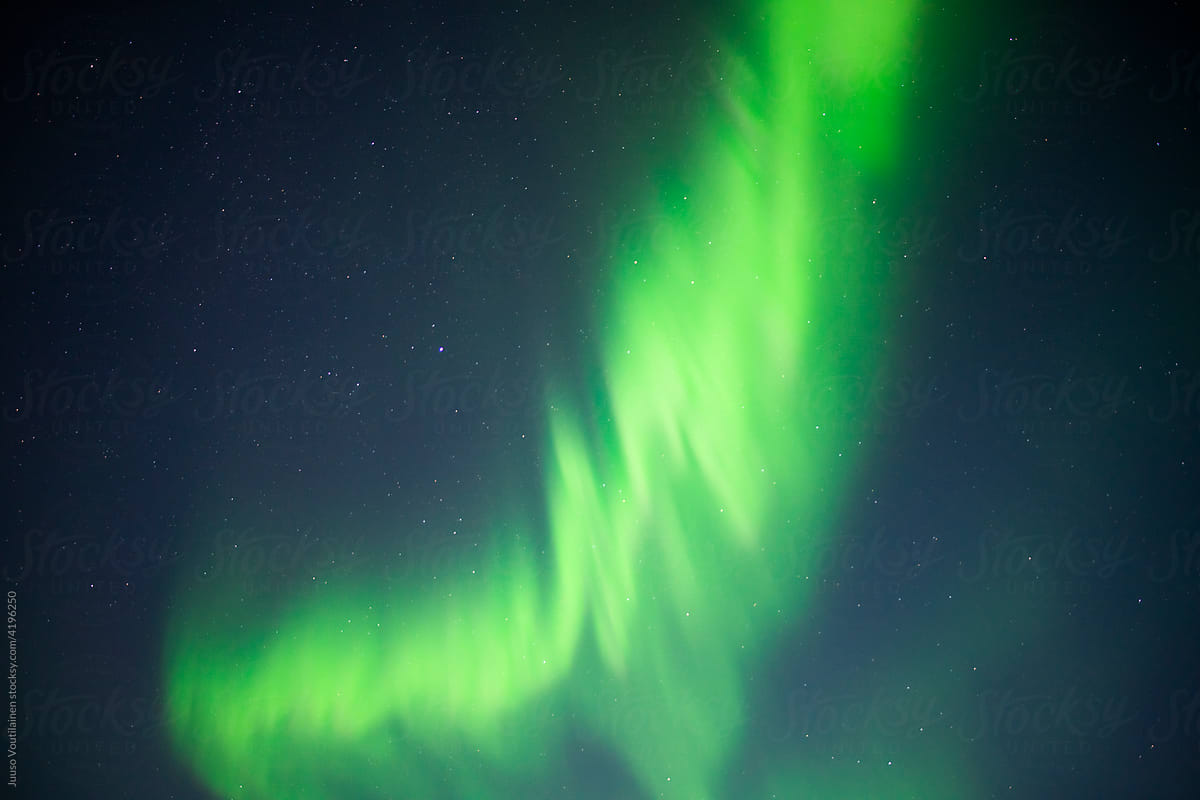 Northern Lights Creates a Display of Light and Color On the Starry Sky