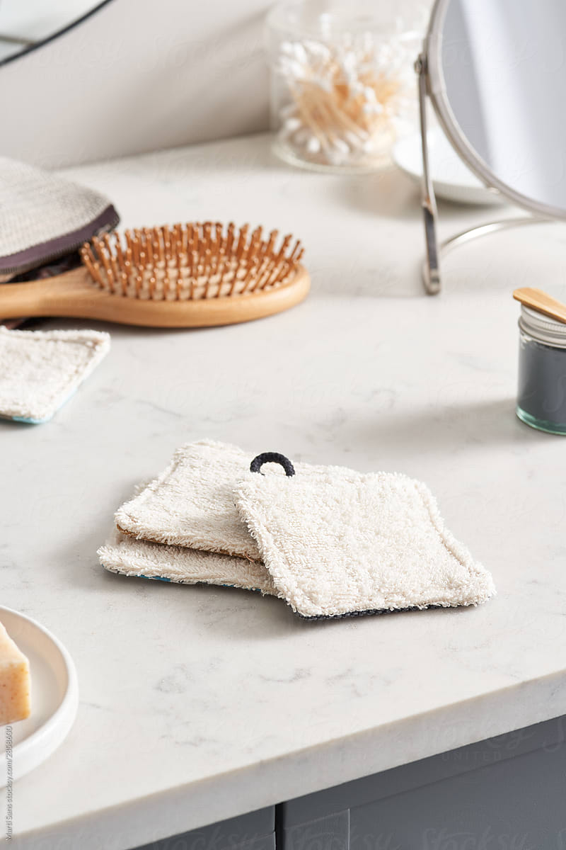 Reusable makeup pads on marble tabletop