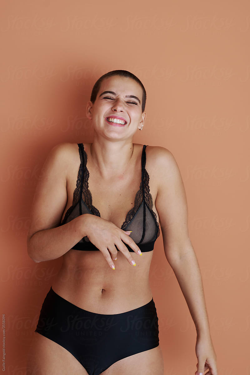 Underwear model laughing. Body positive