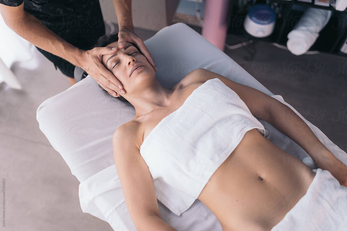 Relaxed woman on a massage treatment