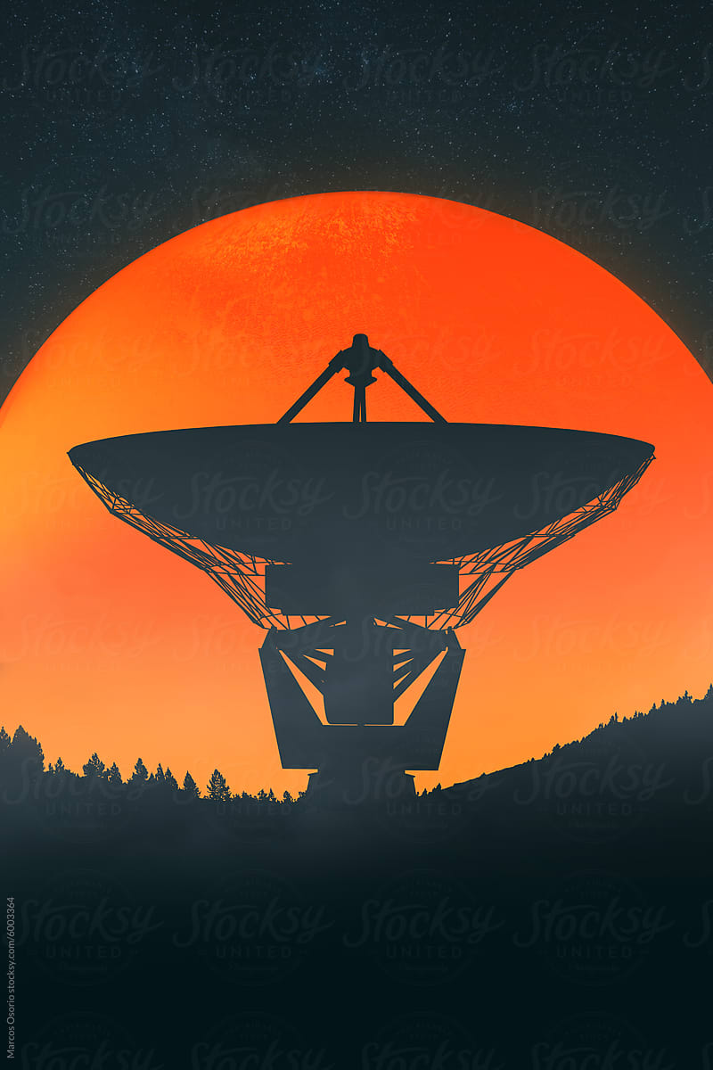 Twilight radio telescope silhouette against orange sky