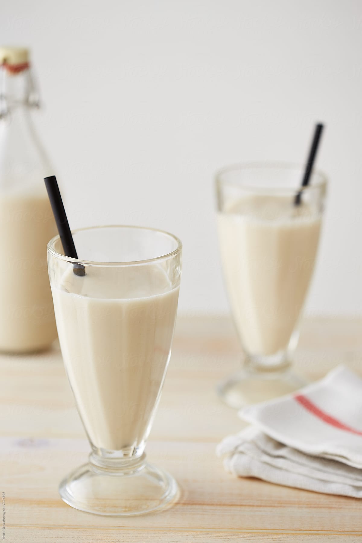 Homemade Valencian horchata in glasses and bottle