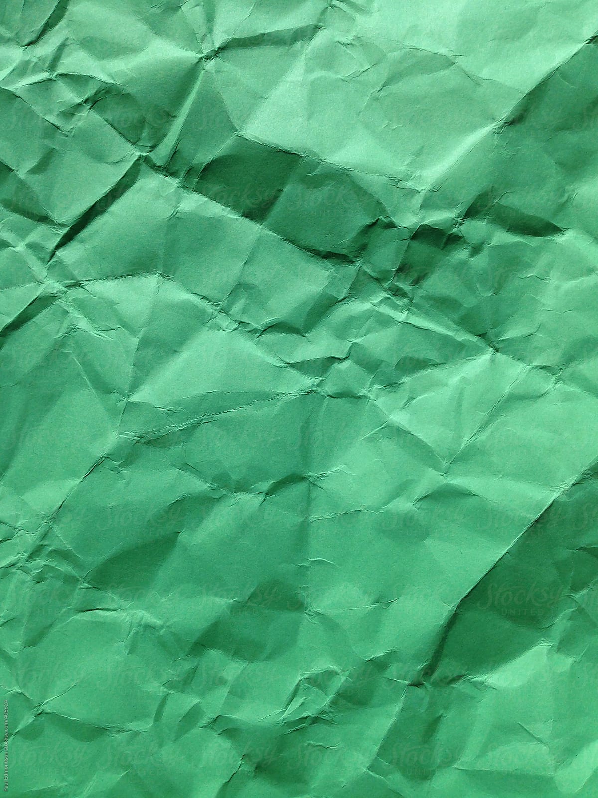 Close Up Of Crumpled Piece Of Colorful Construction Paper by Stocksy  Contributor Rialto Images - Stocksy