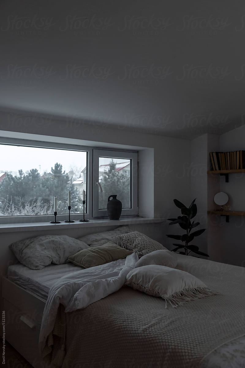 Simple cozy bedroom interior in house