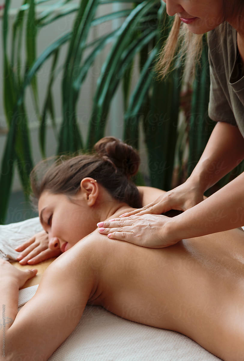 Woman enjoying calming back massage