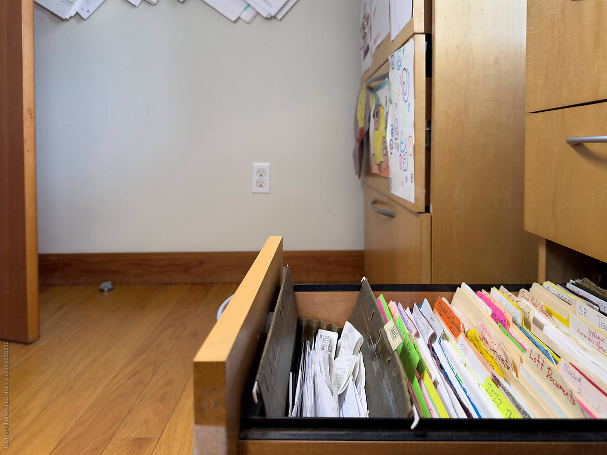 Tax Receipts  in file folder in file cabinet  in home office