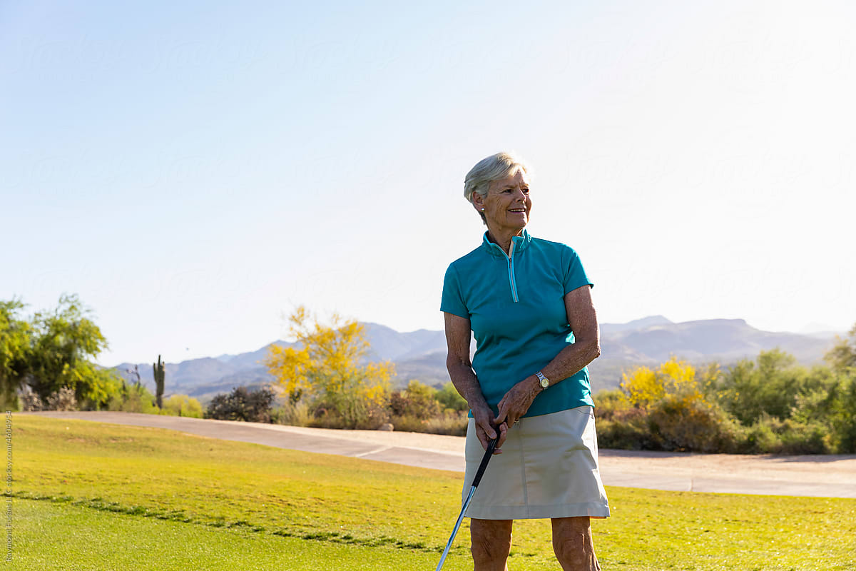Confident and happy smiling  Senior Citizen Playing golf