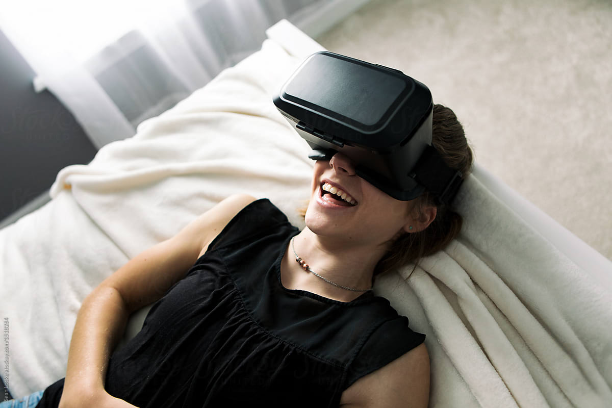 Teenager: Girl Laughs At Virtual Reality Experience