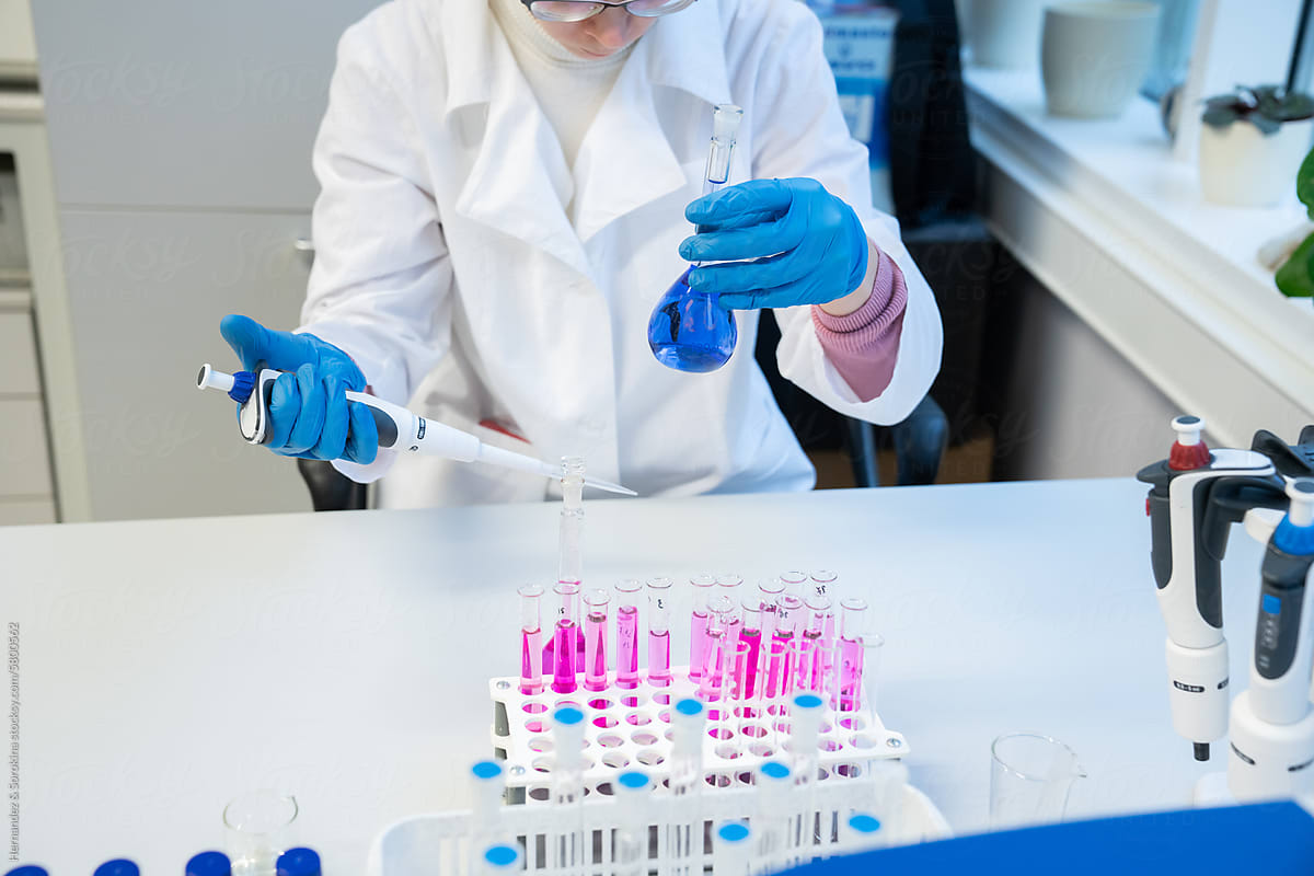 Anonymous Scientist Working In Laboratory