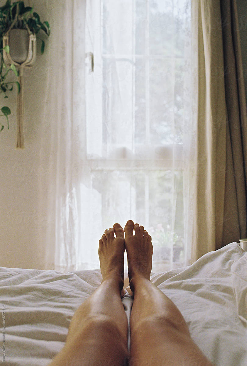 Feet on the bed in the morning