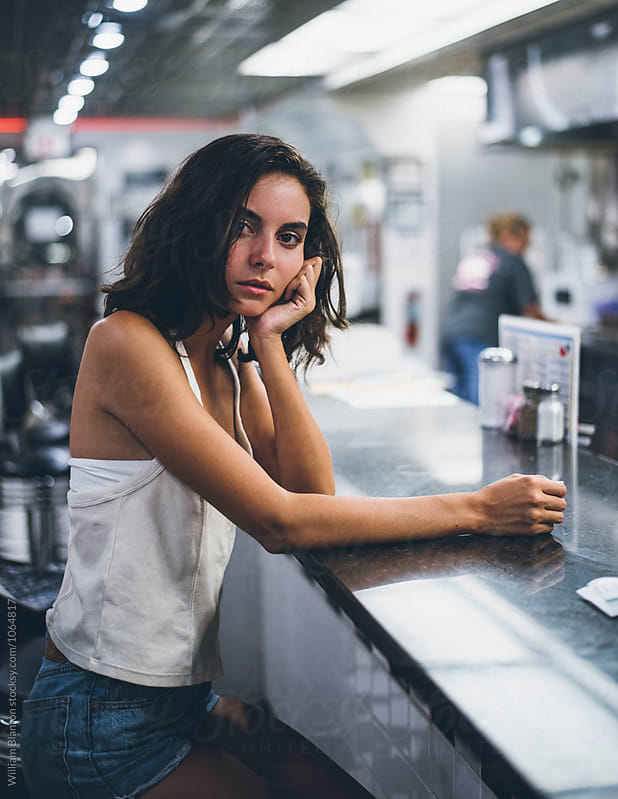 Teenaged Girl in Small Town Diner