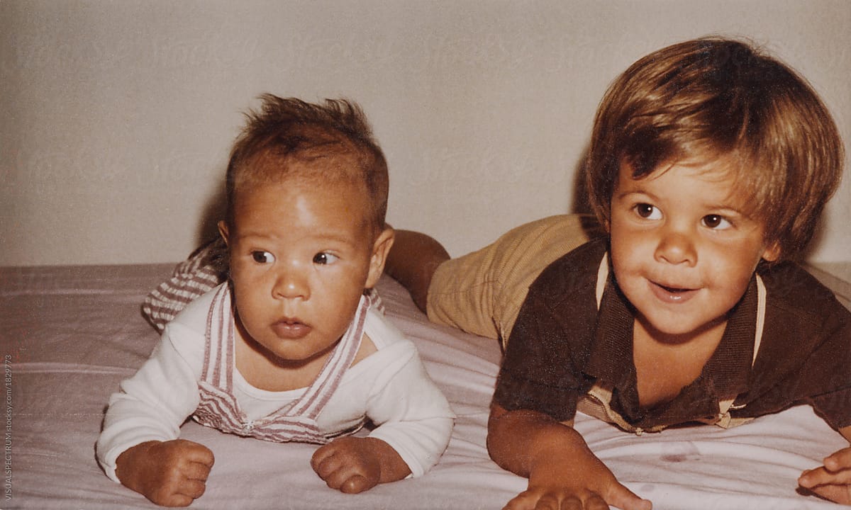 Vintage Photograph of Two Small Kids Lying on Their Bellies