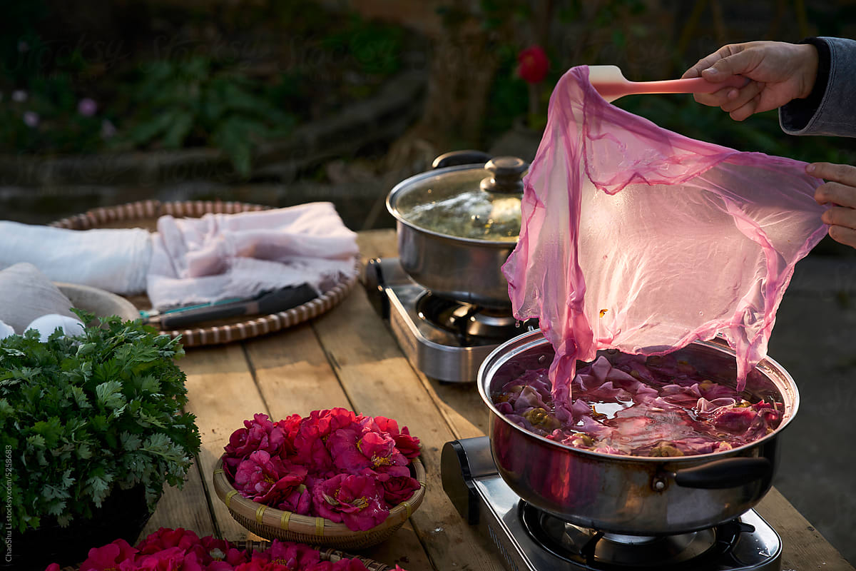 Closeup of fabric being dyed, put into boiled dye water