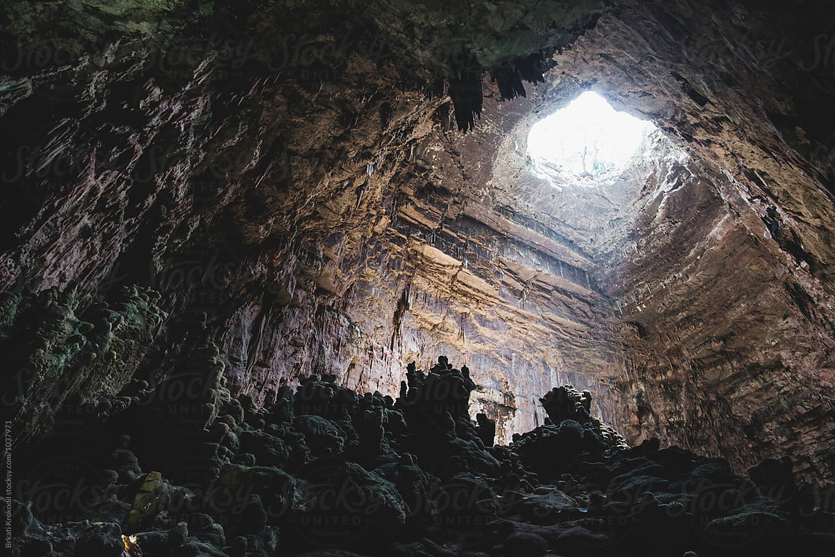 Light From The Above Illuminates A Cave