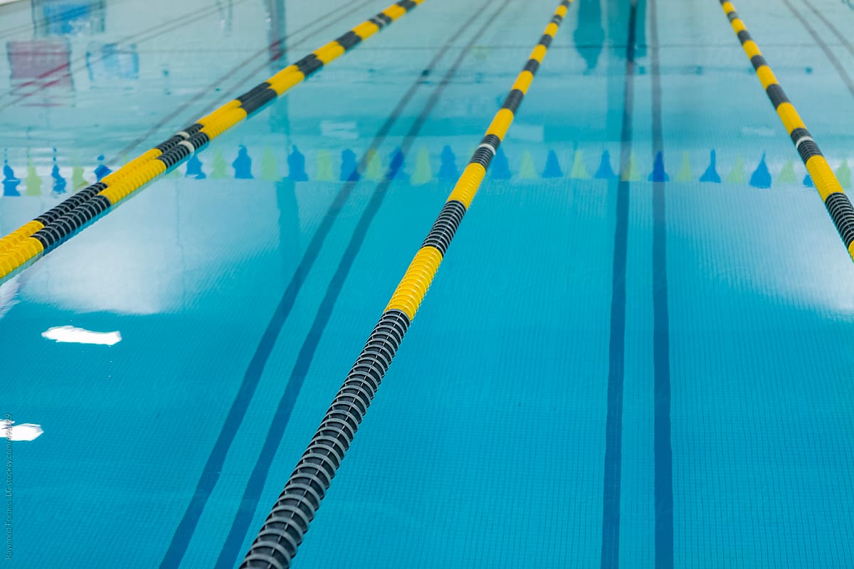 Swimming pool water surface  with divided lanes