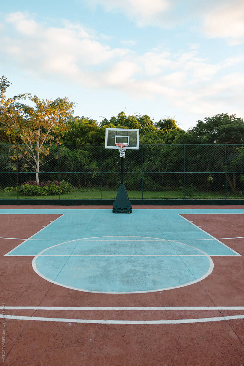 Empty Basketball Court at Dusk
