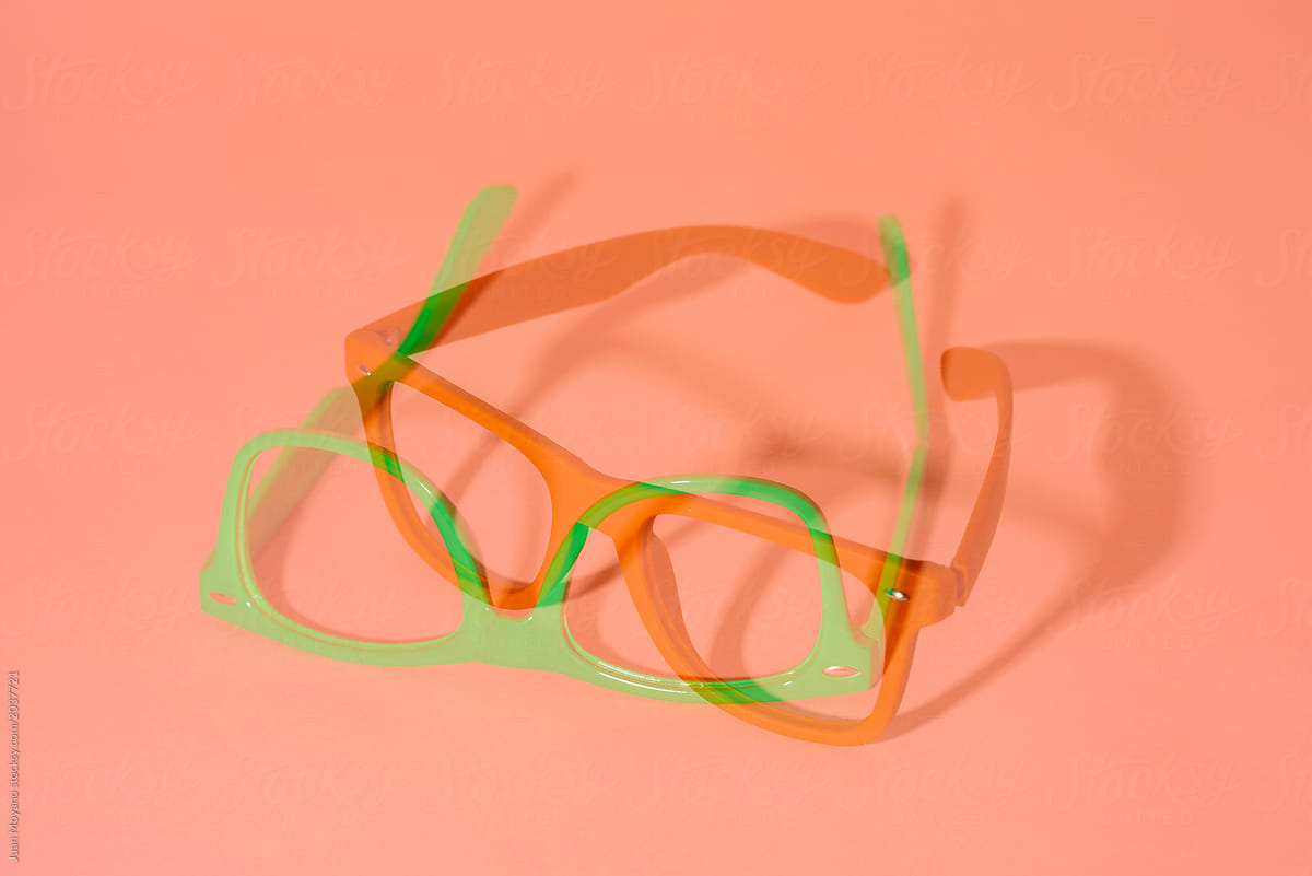 double exposure of two different colorful eyeglasses