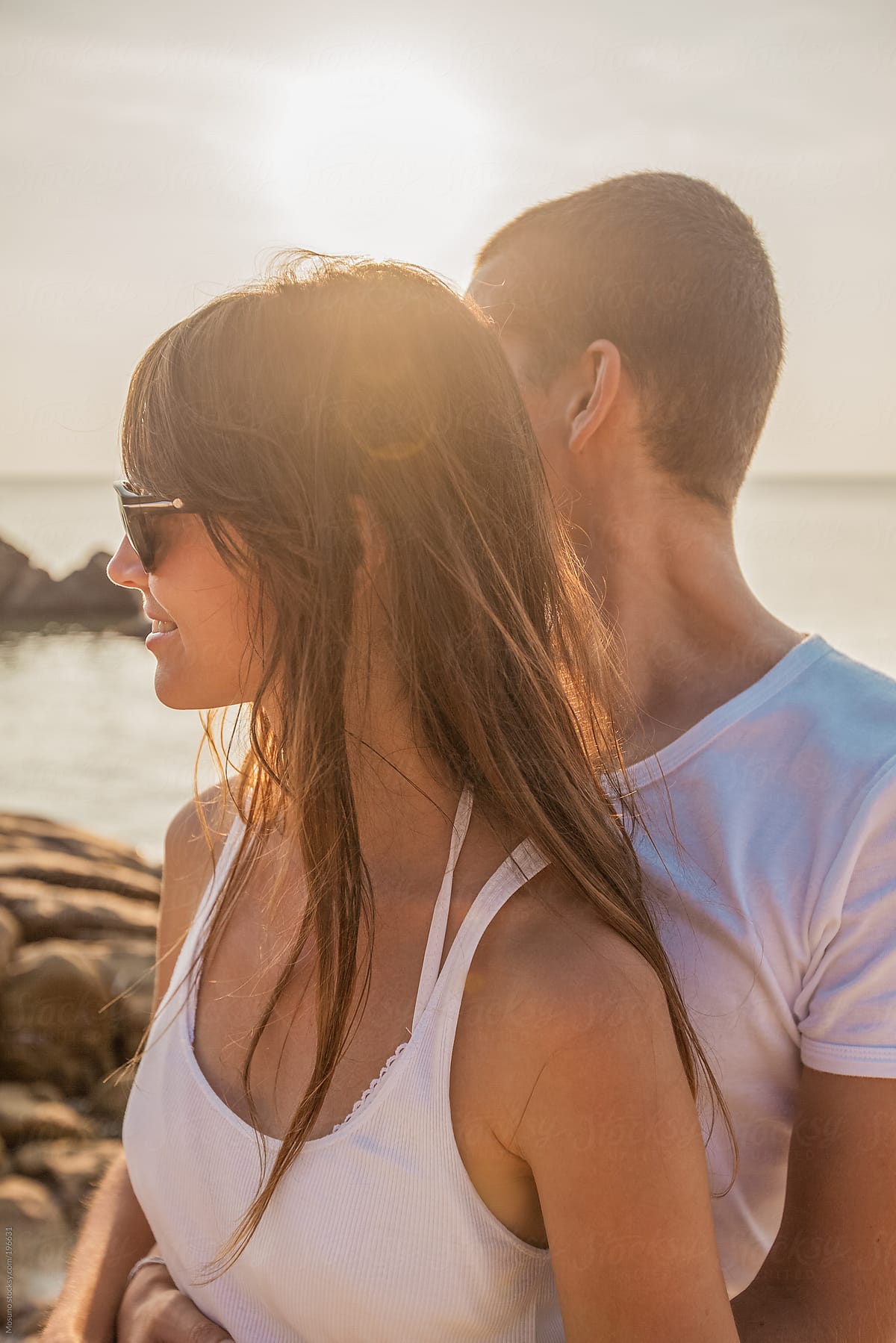 Couple At The Beach At Sunset By Stocksy Contributor Mosuno Stocksy